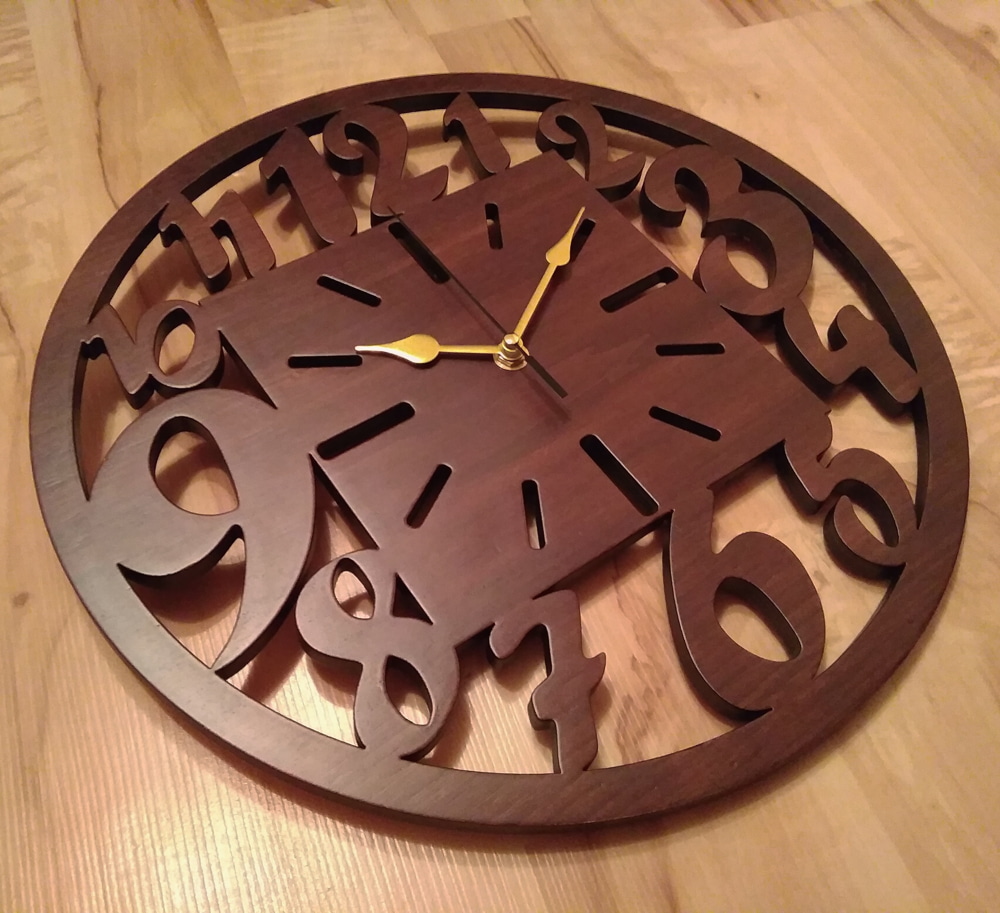 Laser Cut Unique Wooden Wall Clock Free CDR Vectors Art