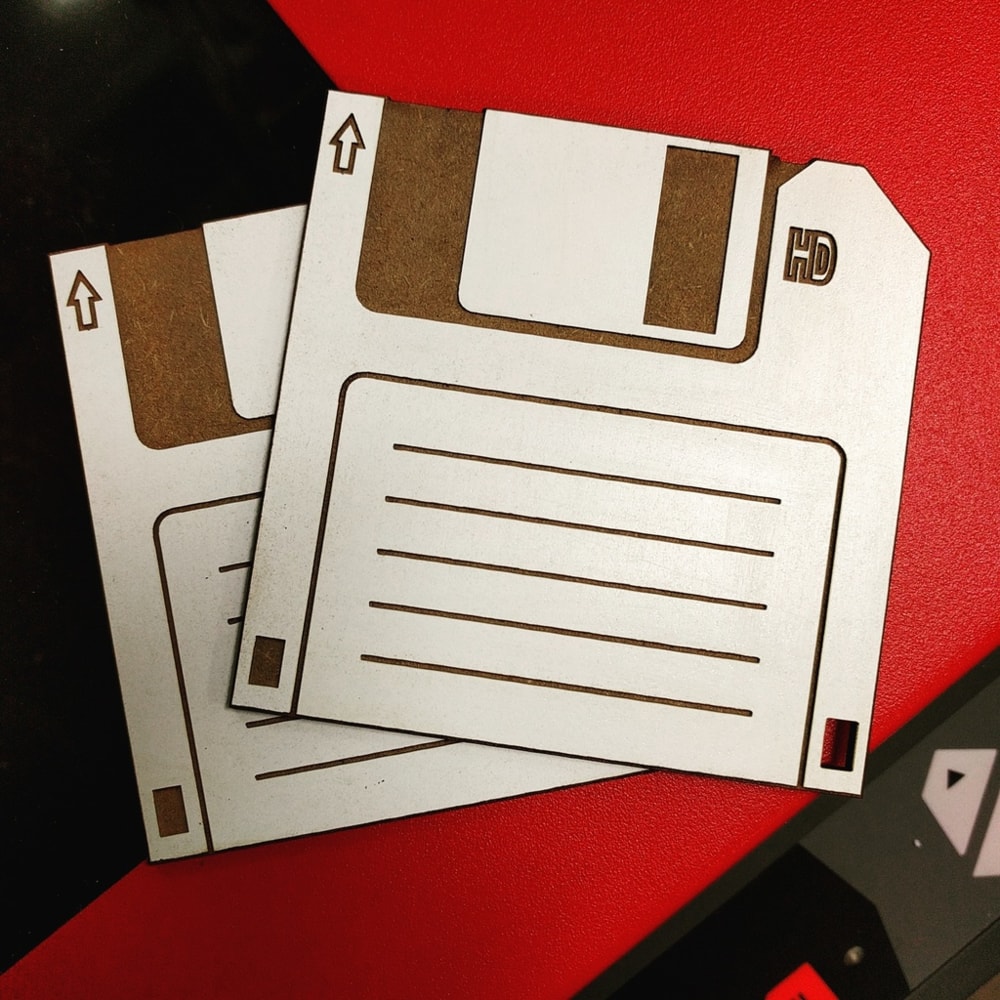 Laser Cut Etched Floppy Disk Coasters Free CDR Vectors Art