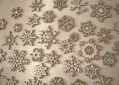 Laser Cut Wooden Snowflake Ornaments Free CDR Vectors Art