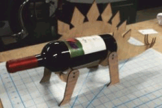 Cnc Laser Cut Stegosaurus Shaped Wine Bottle Holder Free CDR Vectors Art